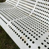 White bench in public garden or park