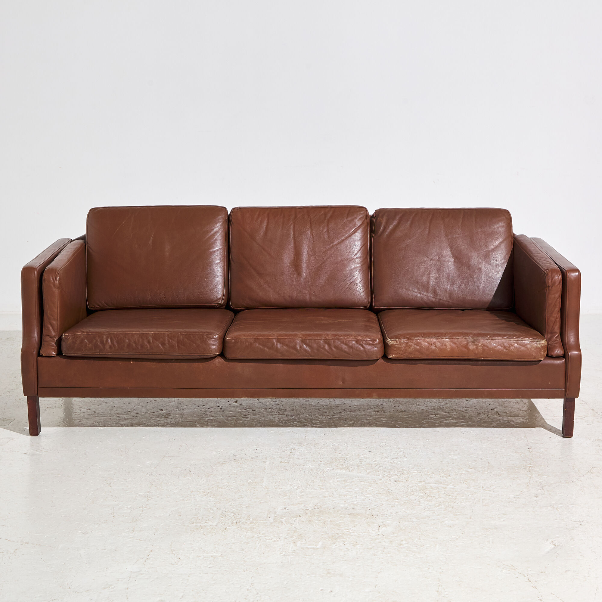 Three-seater leather sofa