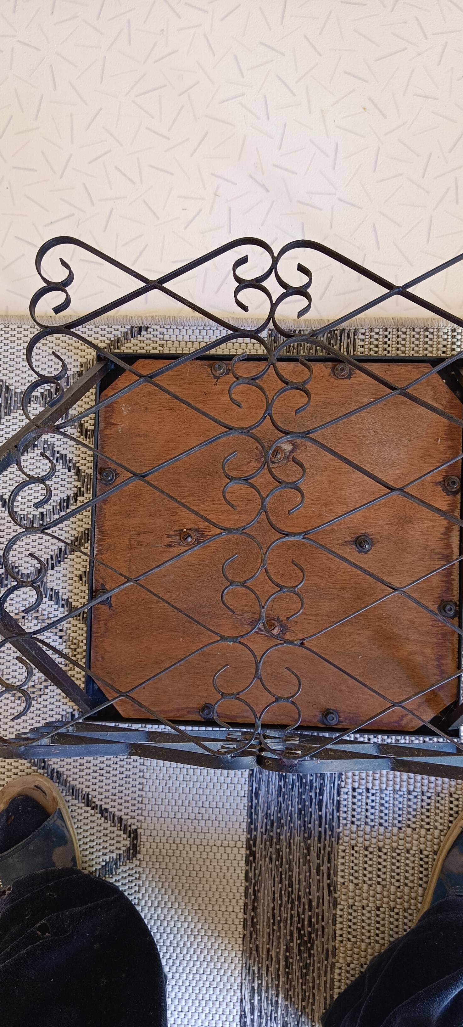 Small square coffee table in wrought iron.
