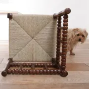 Antique Dutch oak corner chair with turned spindles and new rush seat