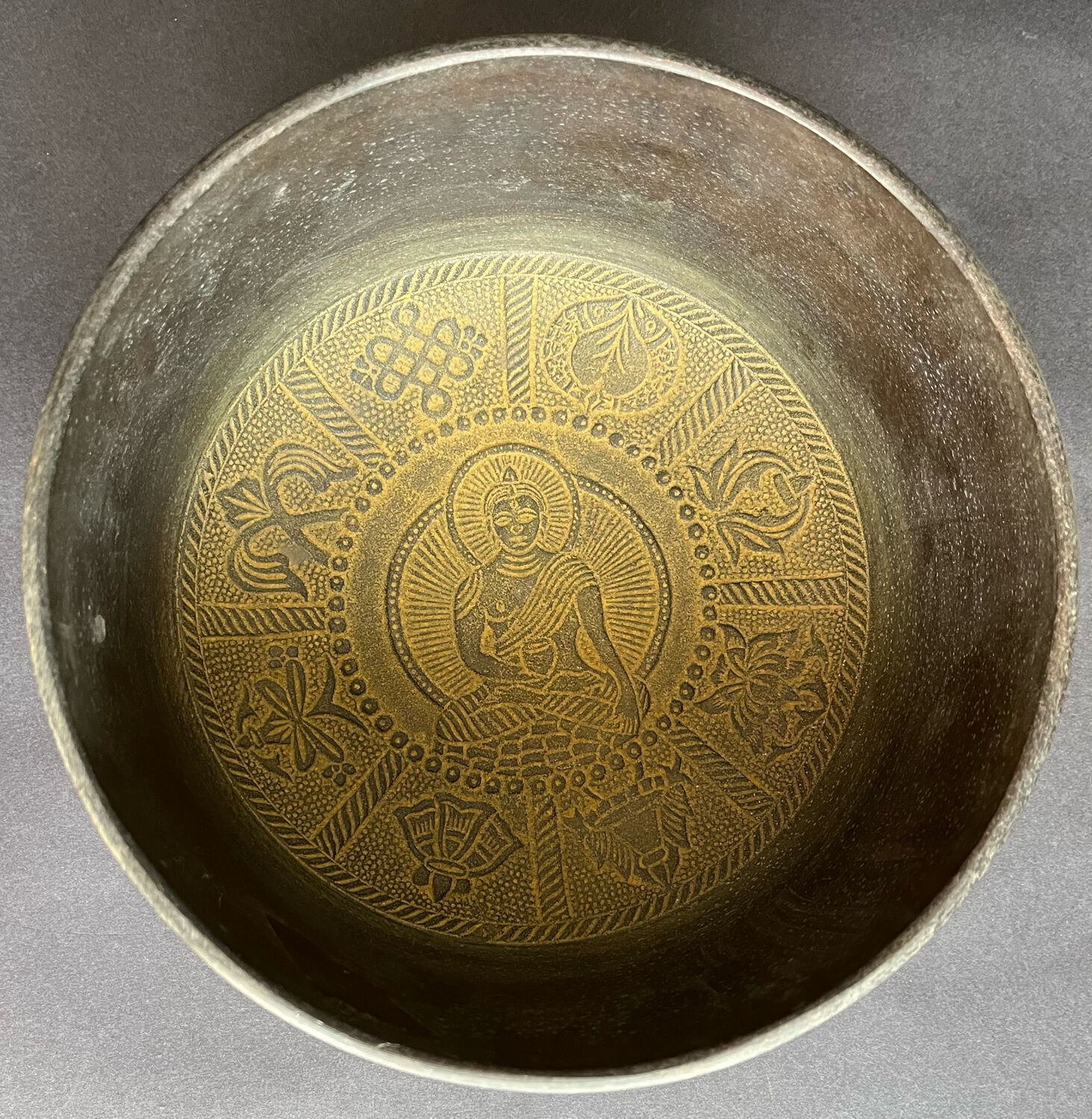 Carved bronze cup