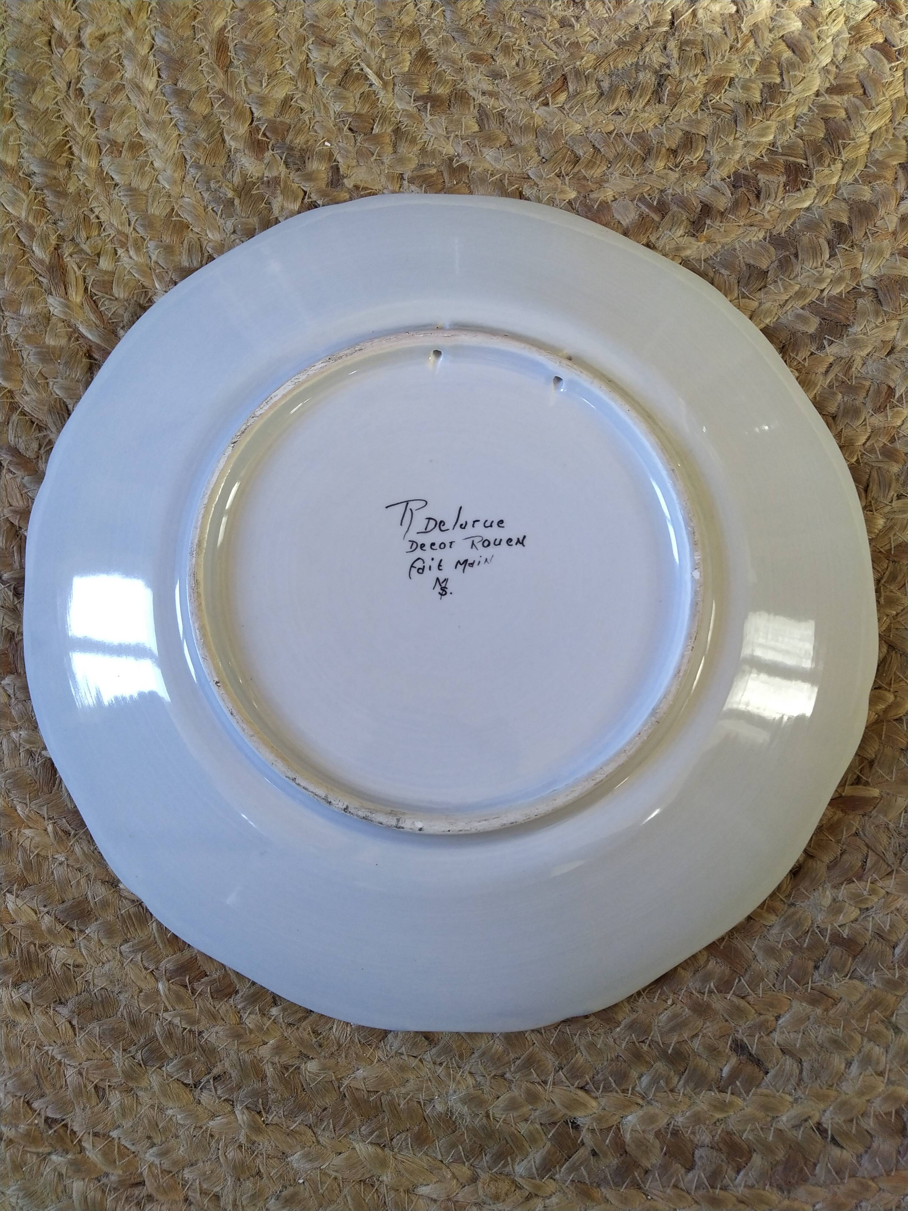 Decorative earthenware plate by René Delarue