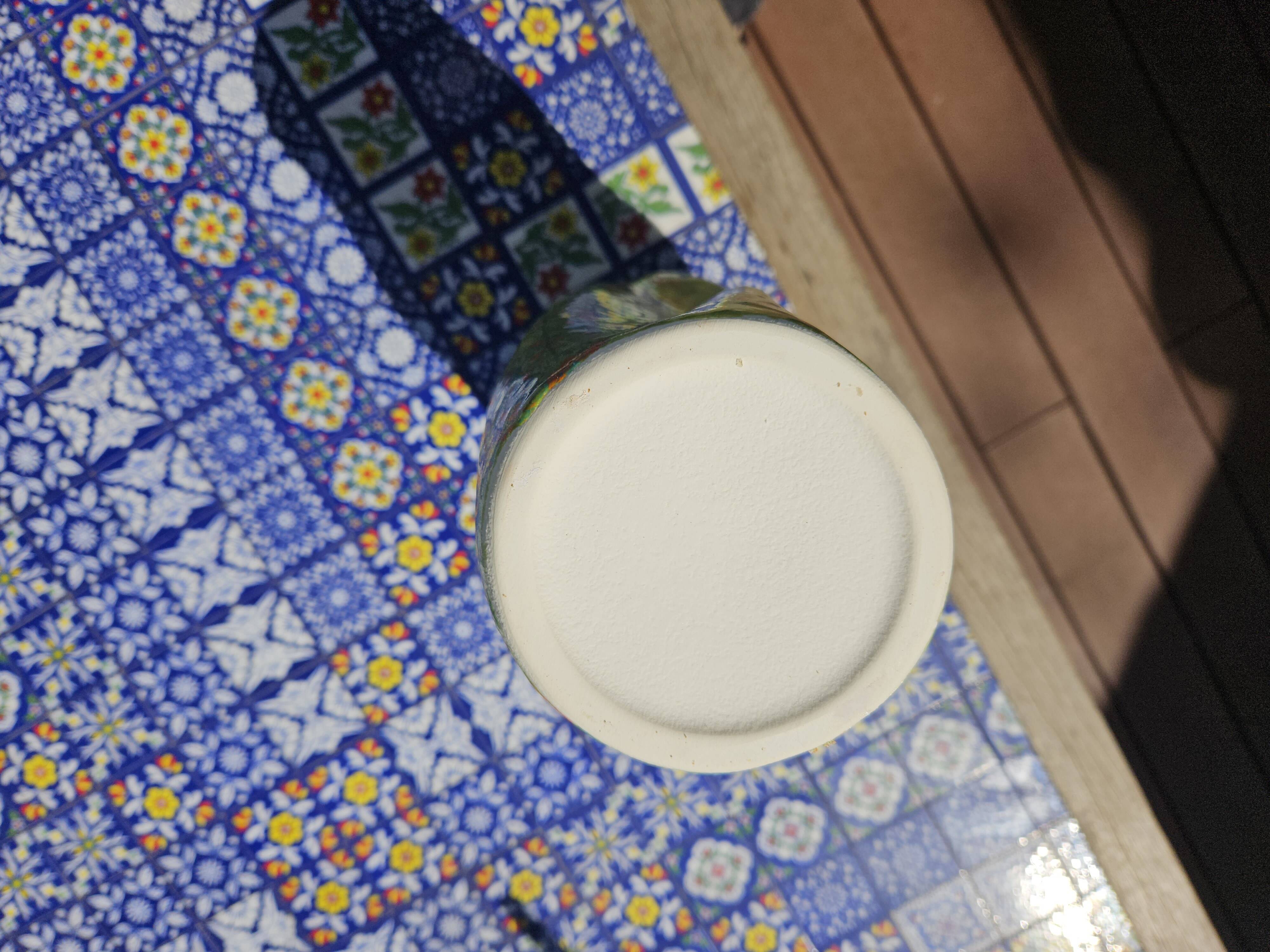 Hand enamelled handkerchief vase