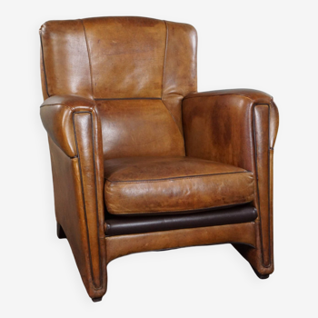 Fauteuil au design moderne et saisissant en cuir de mouton de haute qualité