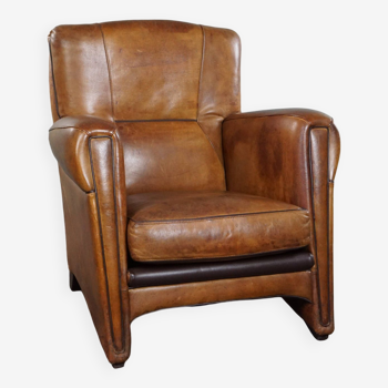 Striking modern design armchair made of high-quality sheepskin leather