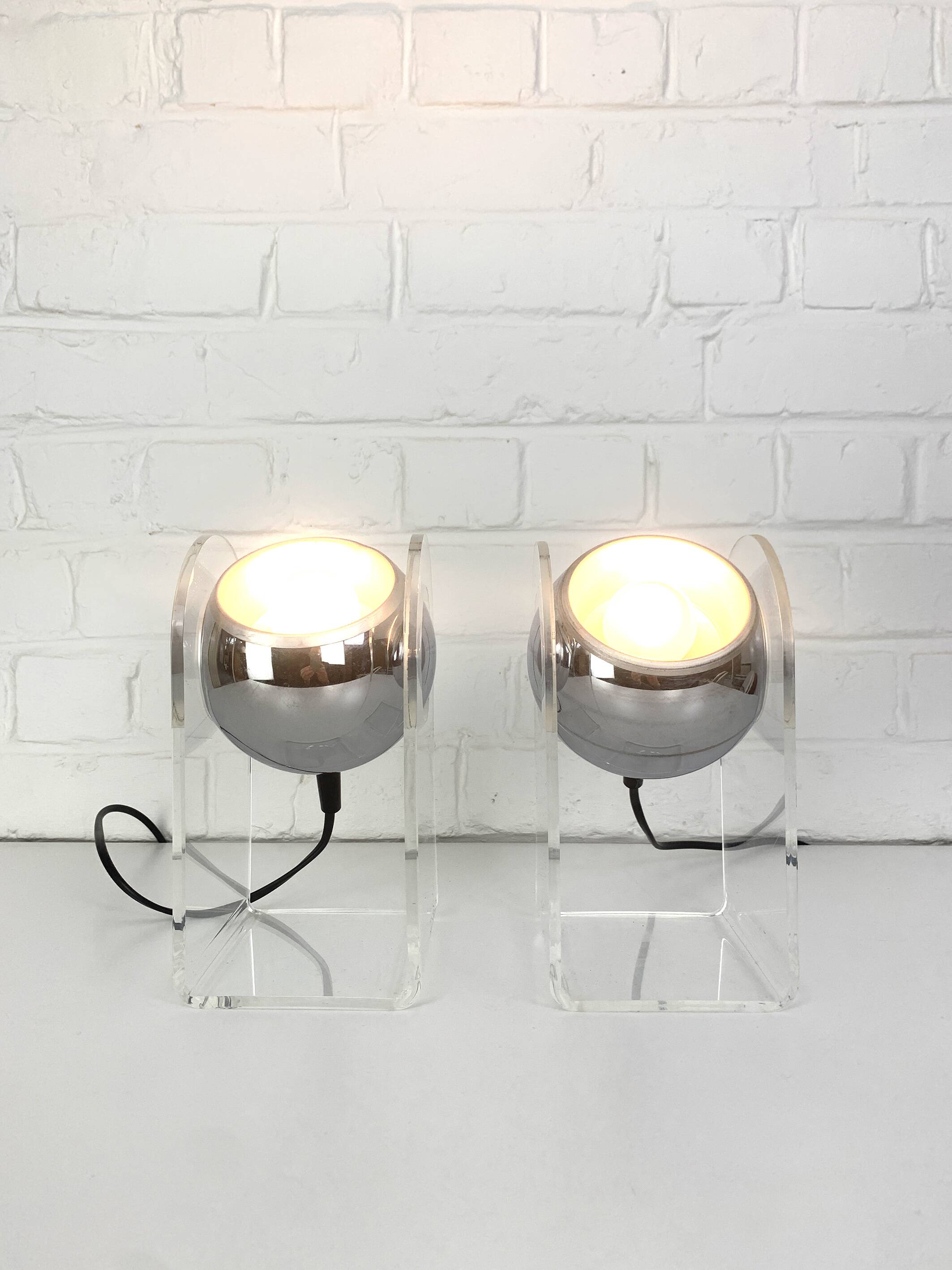 Pair of space age chrome plexiglass sphere table lamps from the 70s