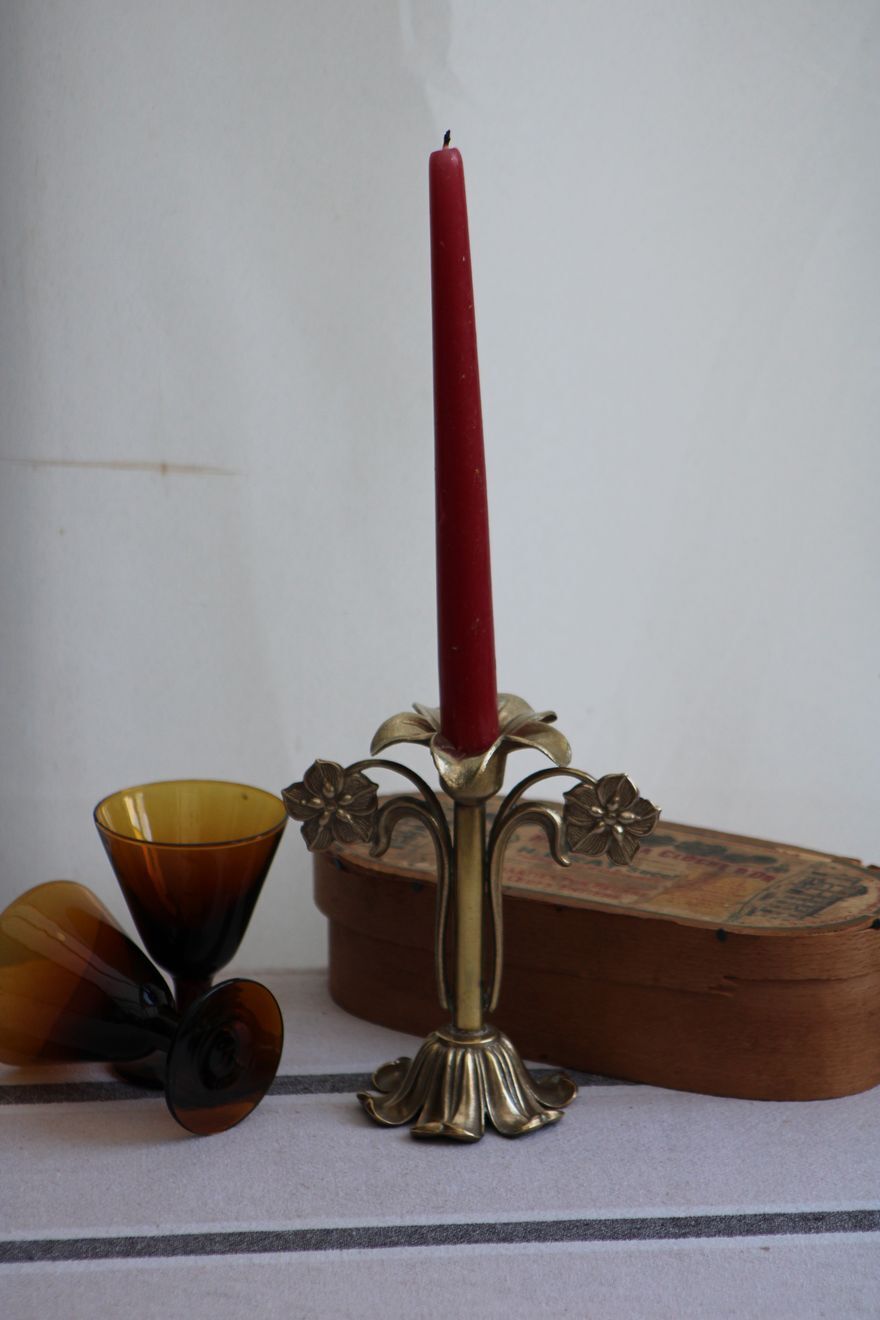 Golden metal stand candle holder