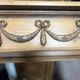 Louis XVI style fireplace in solid fir, 19th century.