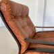 Vintage Scandinavian cognac lounge chair by Oddvin Rykken