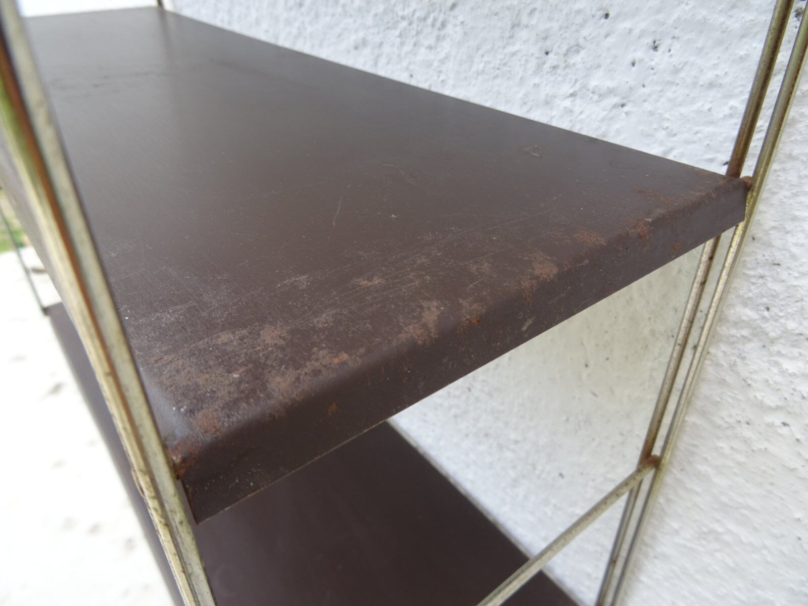 Metal string modular wall shelf