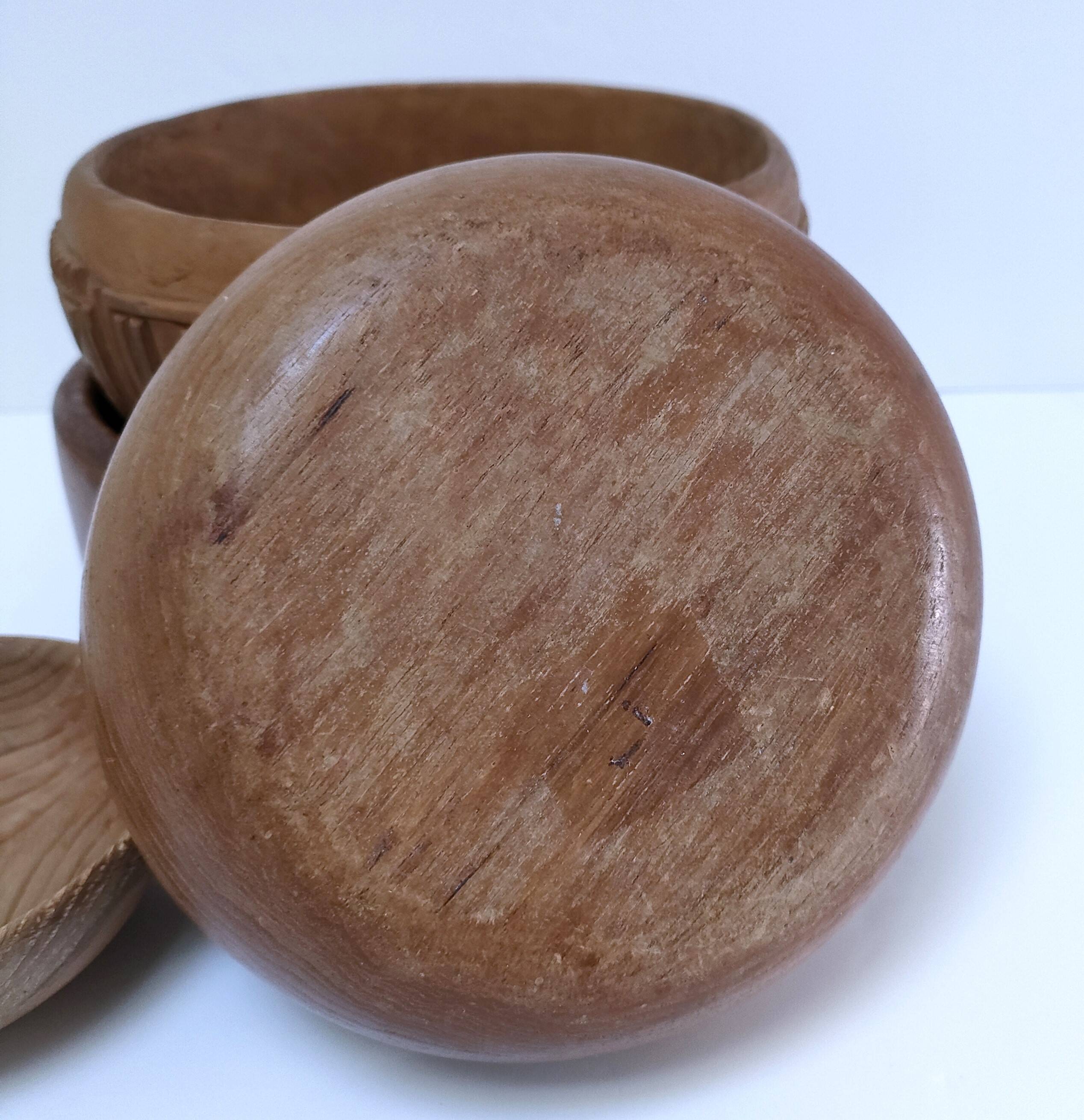 four vintage solid wood bowls