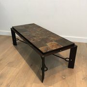 Rare coffee table in steel and wrought iron with a top made of lava stones