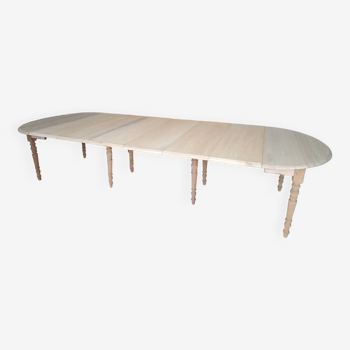 Grande table ovale en bois massif