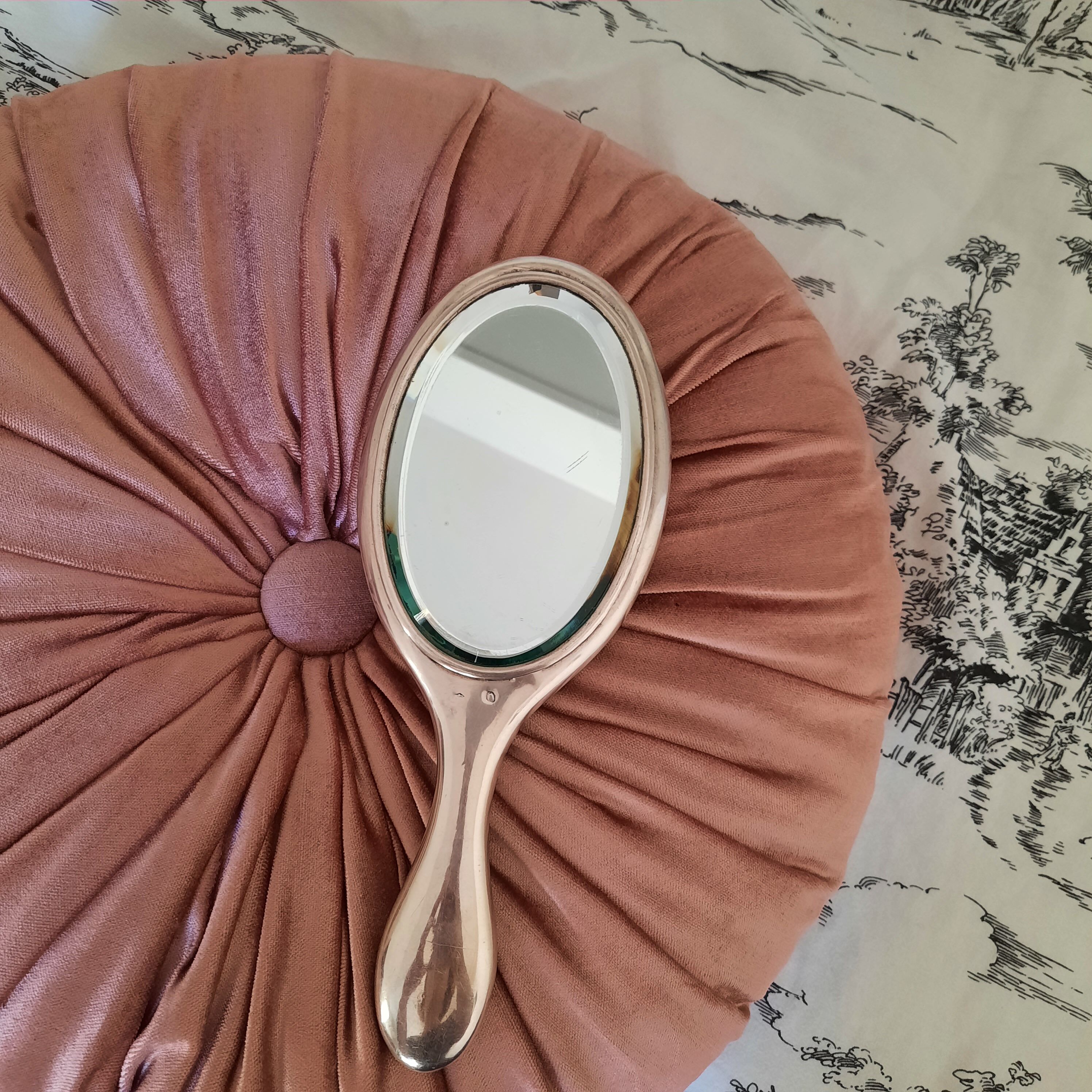 Art Deco hand-facing in silver metal and beveled mirror, circa 1930