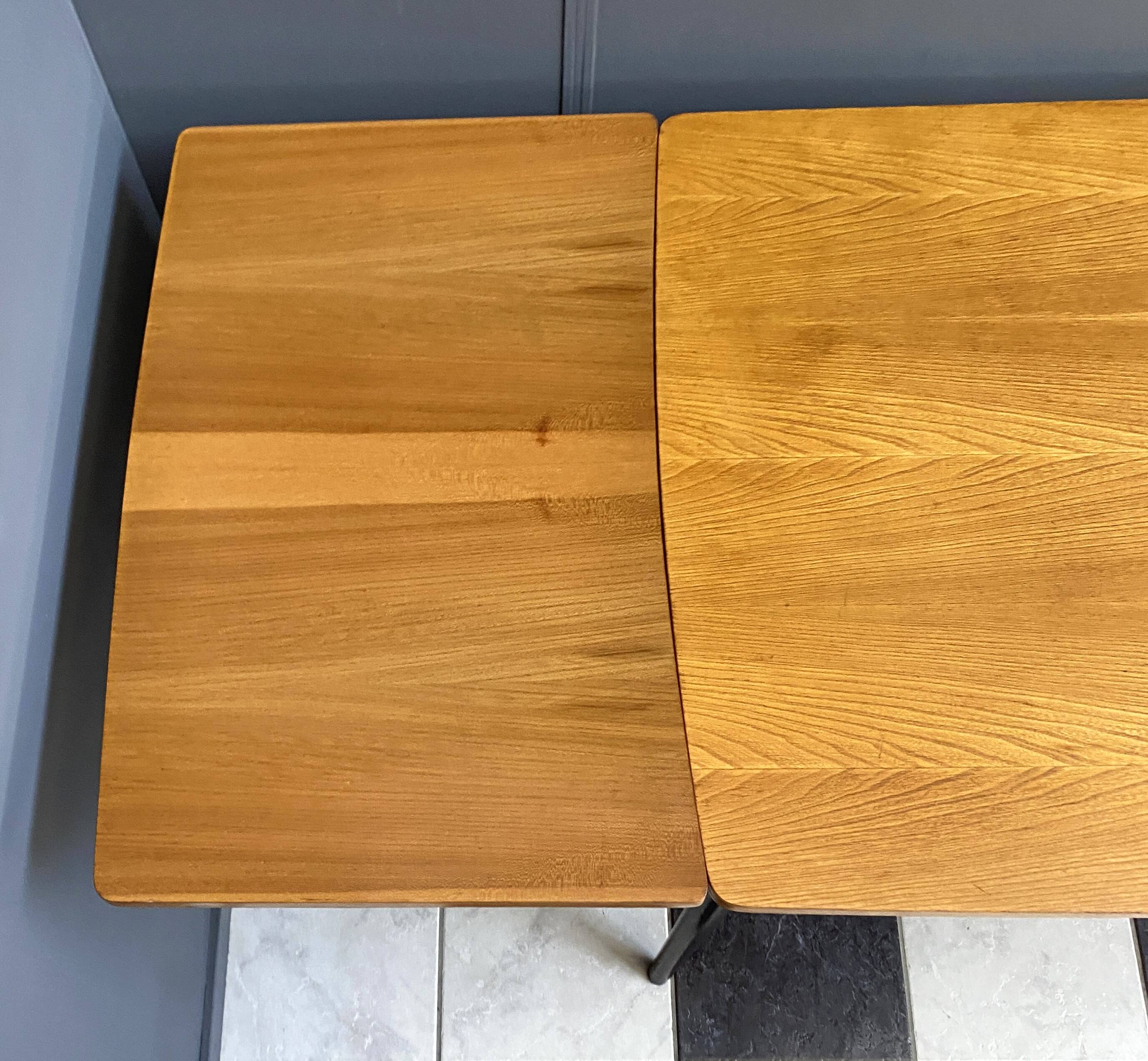 Wood enlarging dining table black wood legs 1960s