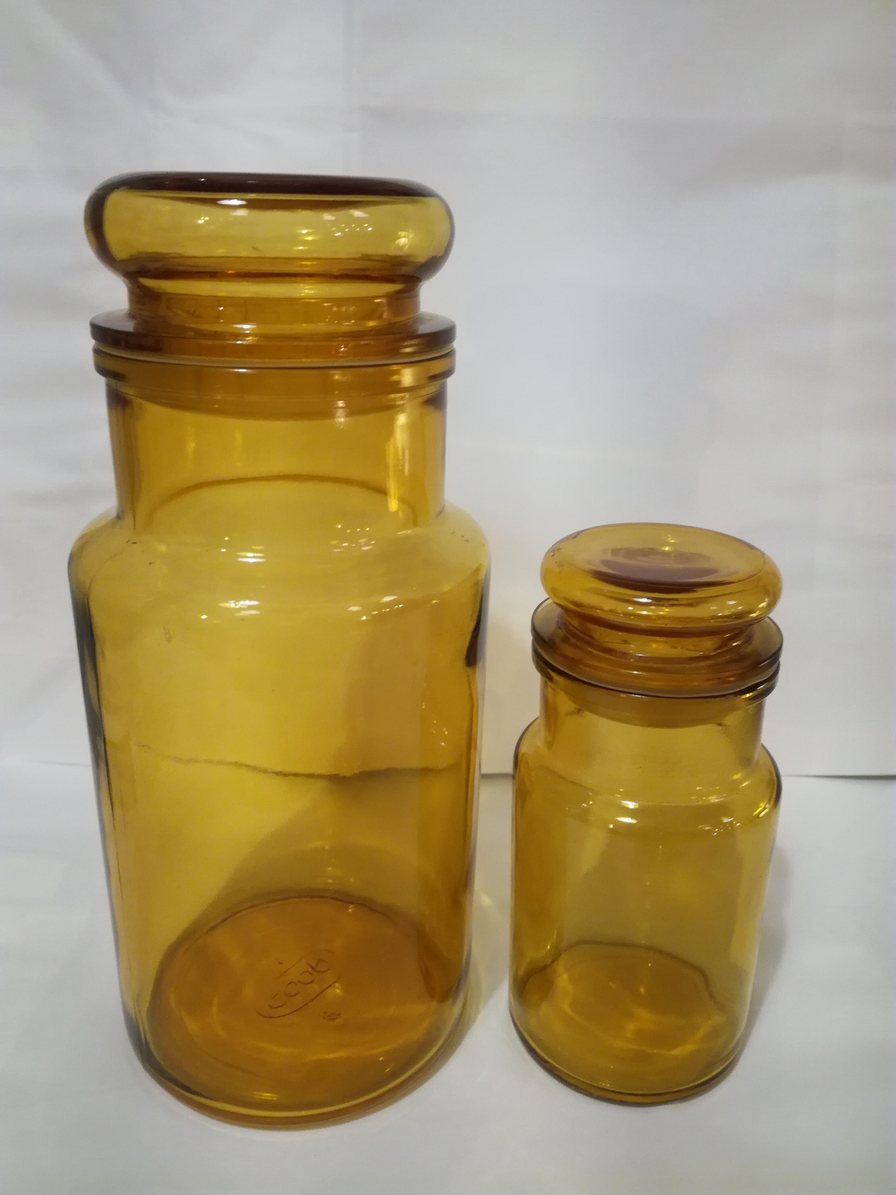 Two amber jars