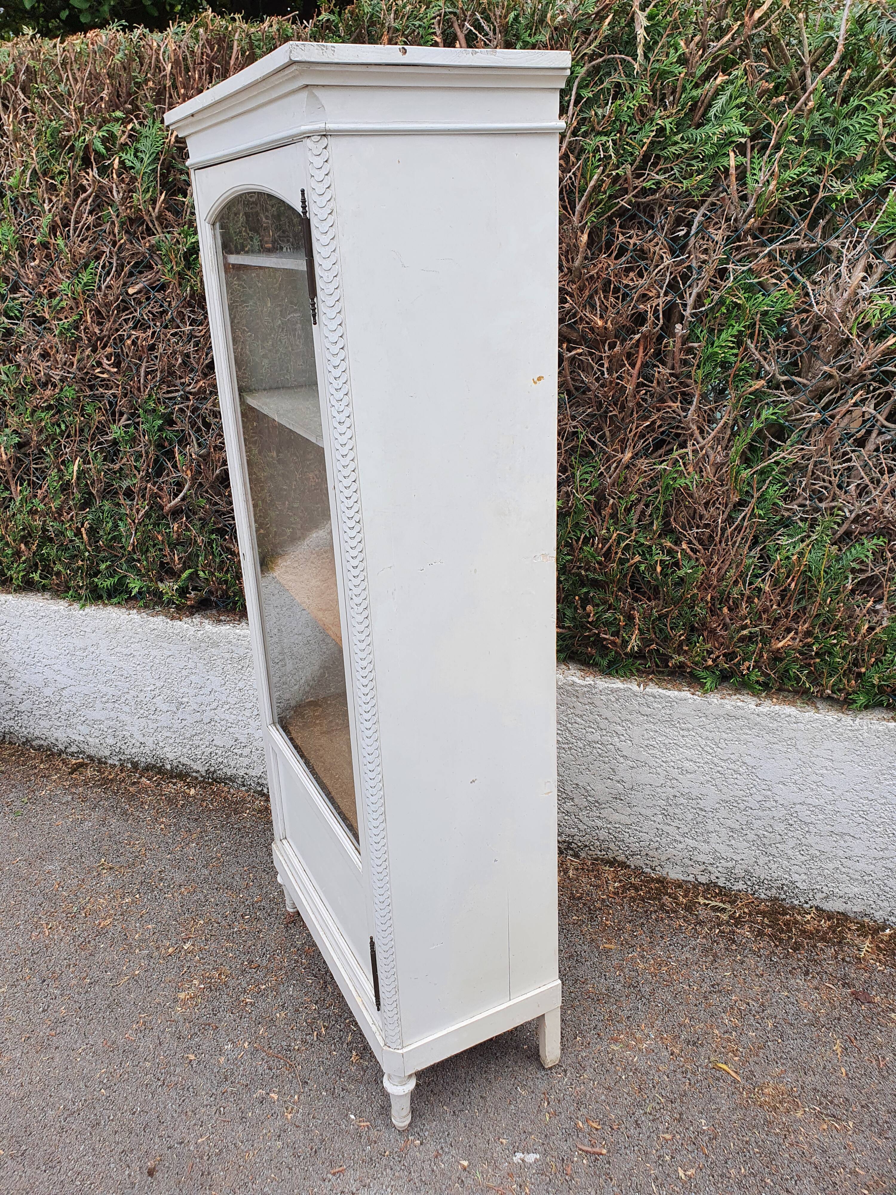 Old grey patinated showcase