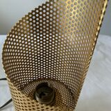 Perforated metal night light.