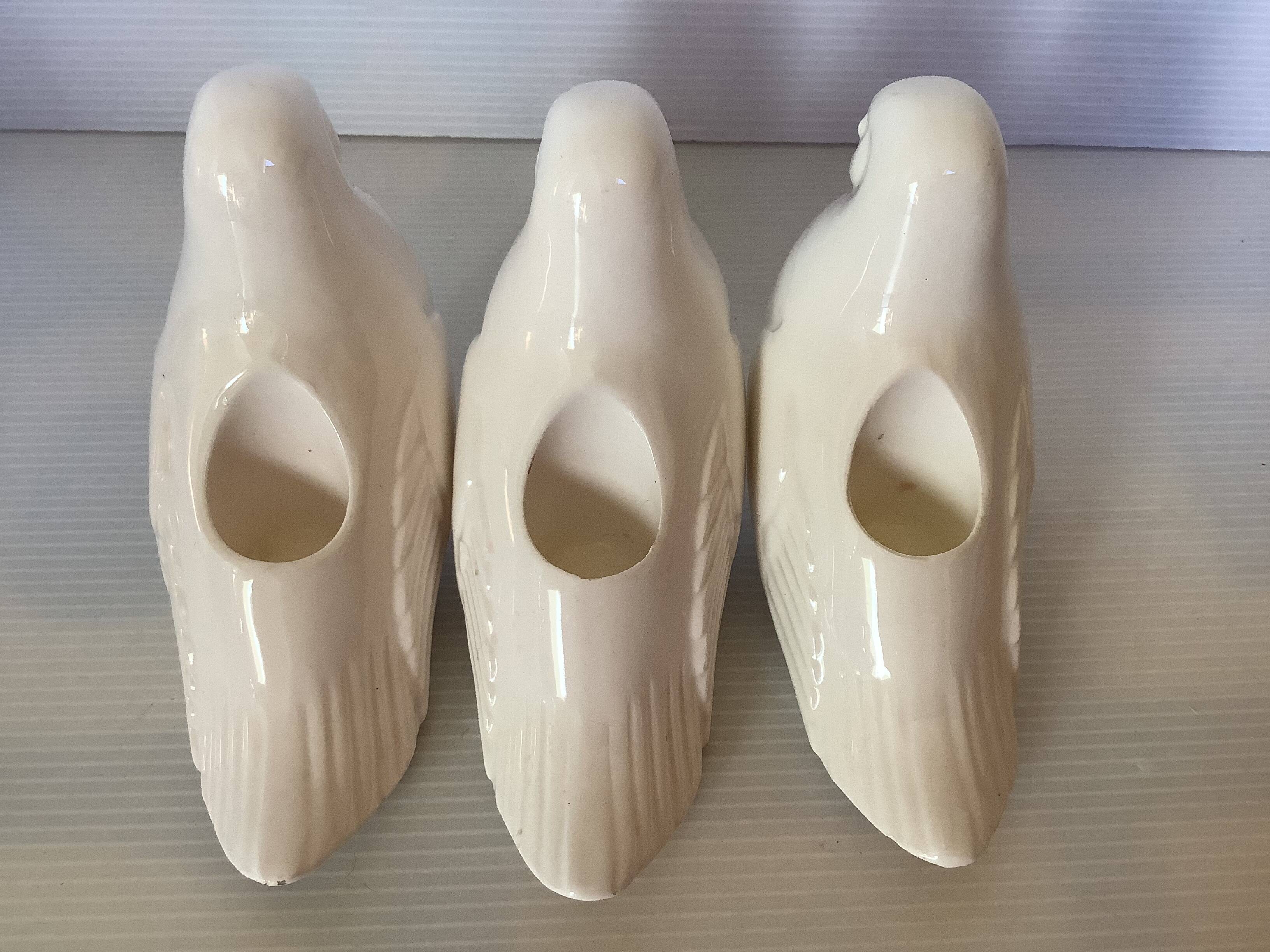 Seven dove bird candle holders