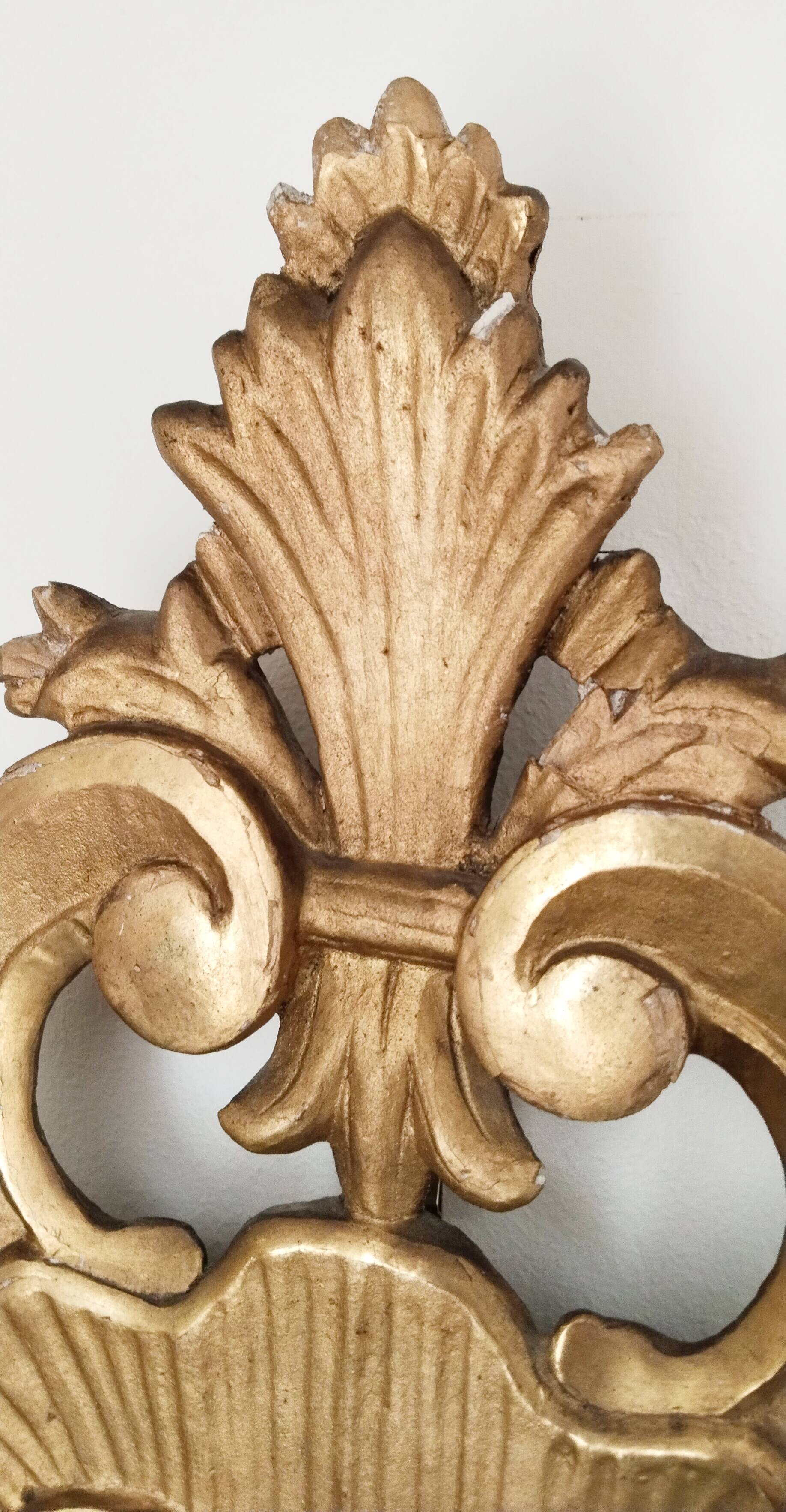 Mirror carved in gilded wood, 19th century