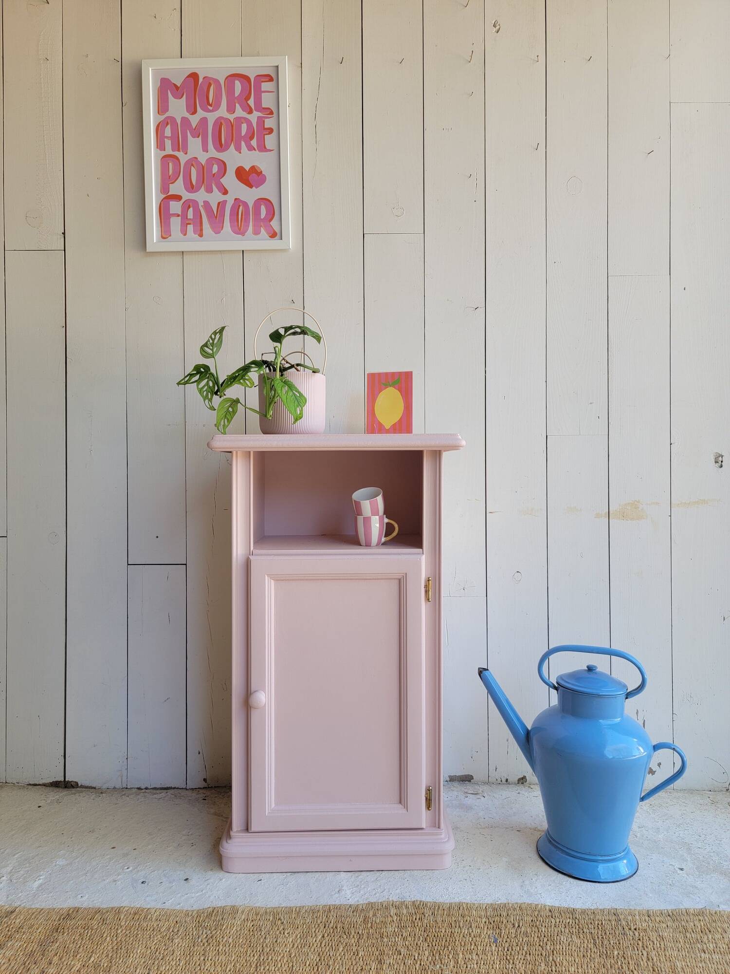 Antique bedside table revamped in pink.