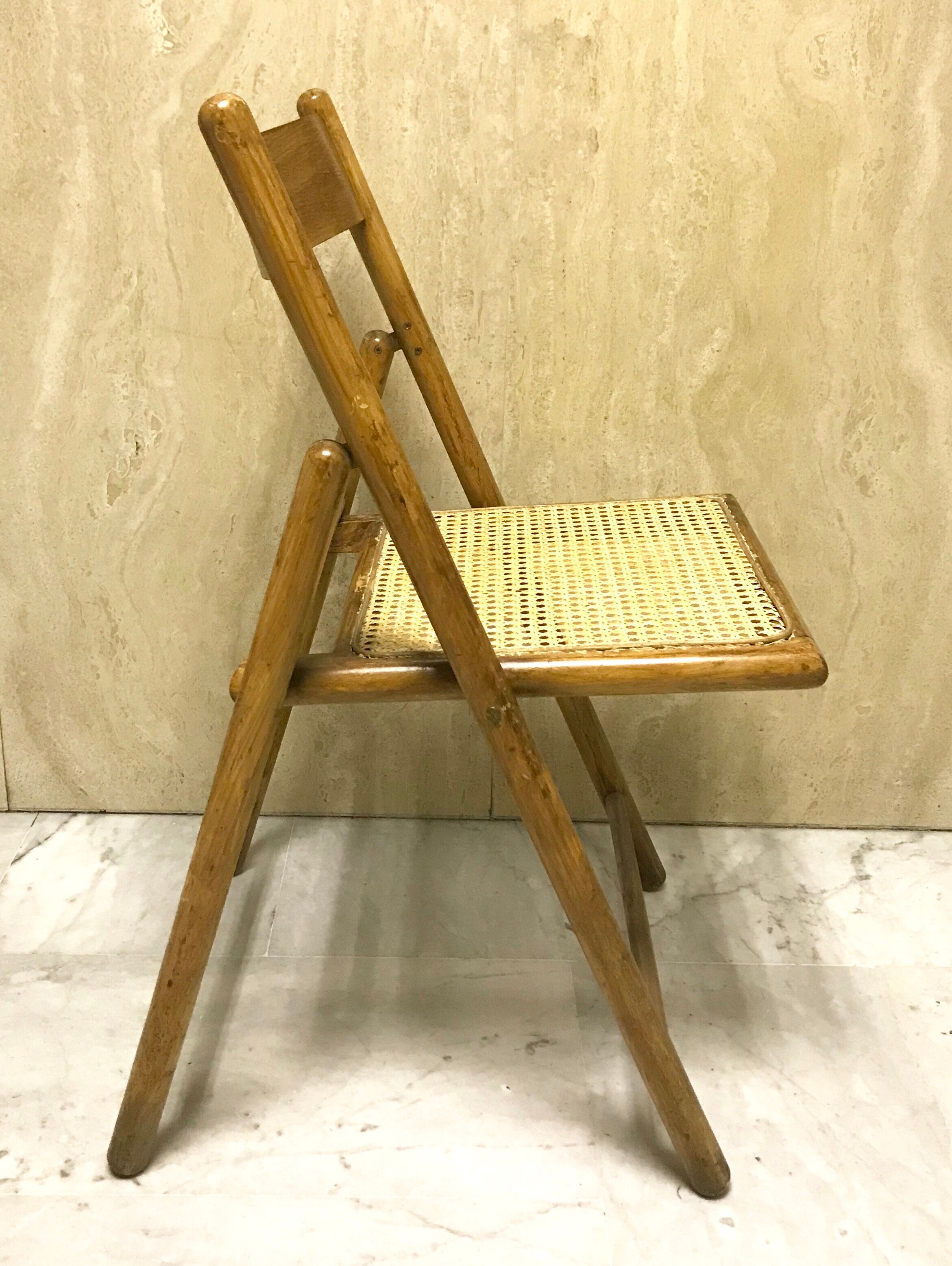 Duo of canned folding chairs