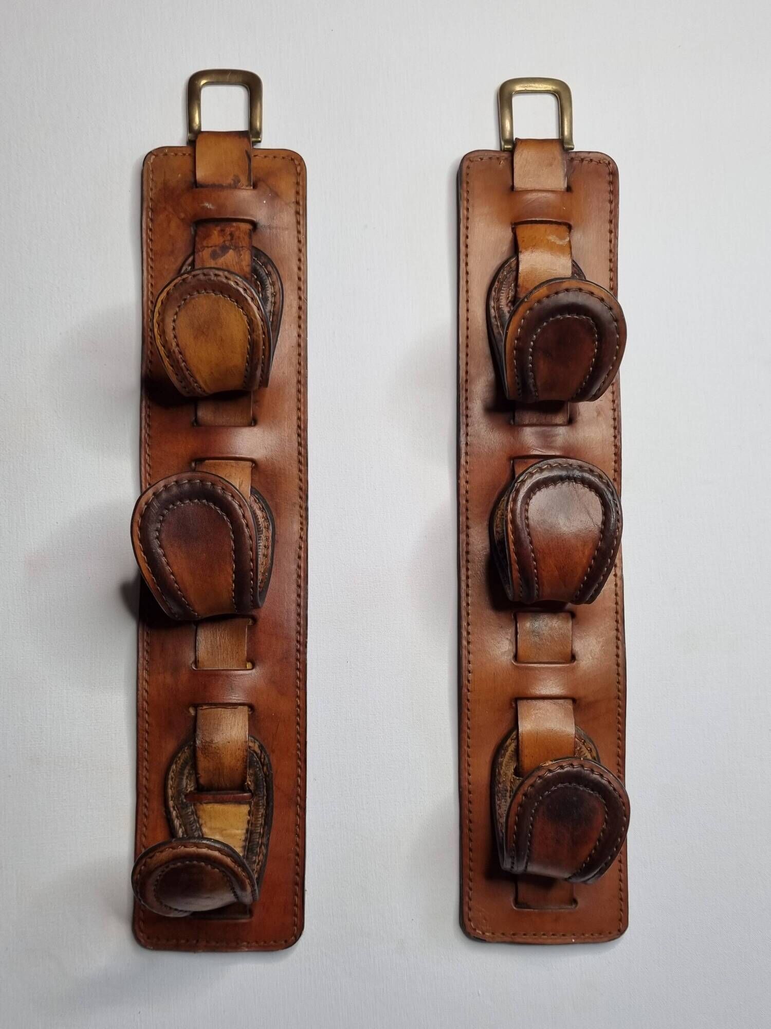 Pair of game bags in saddle leather and brass, old, 3 hooks, 57 cm