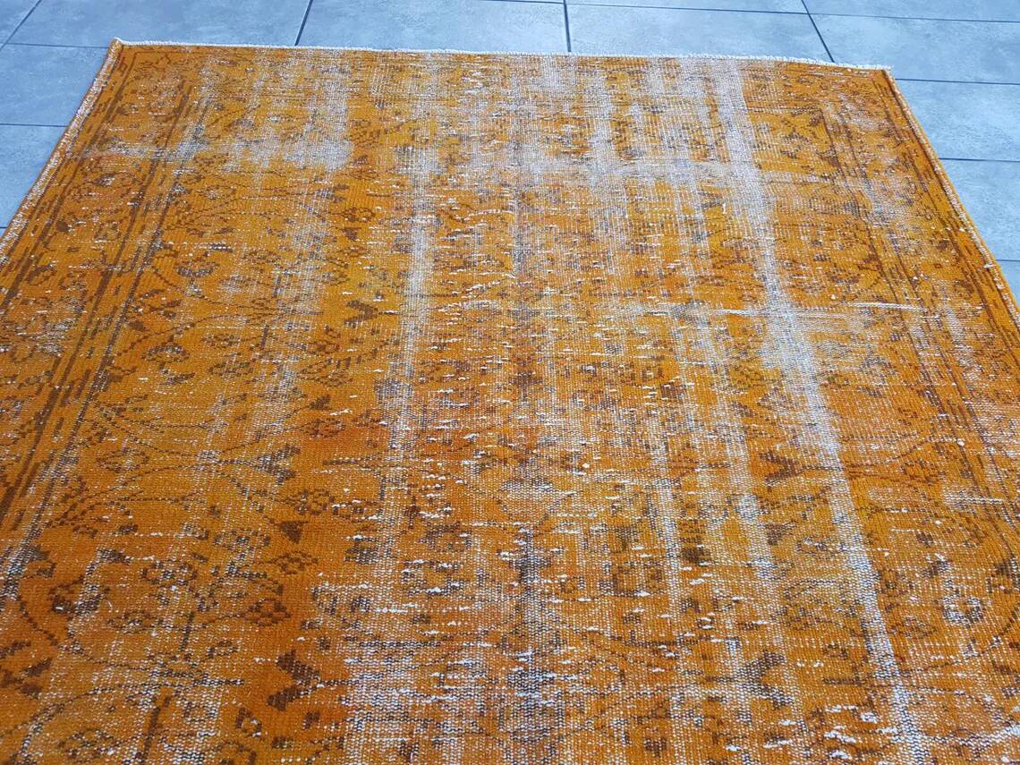 Tapis vintage orange surteint