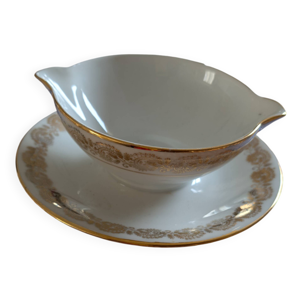 Saucière en porcelaine blanche et dorée