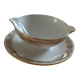 Saucière en porcelaine blanche et dorée
