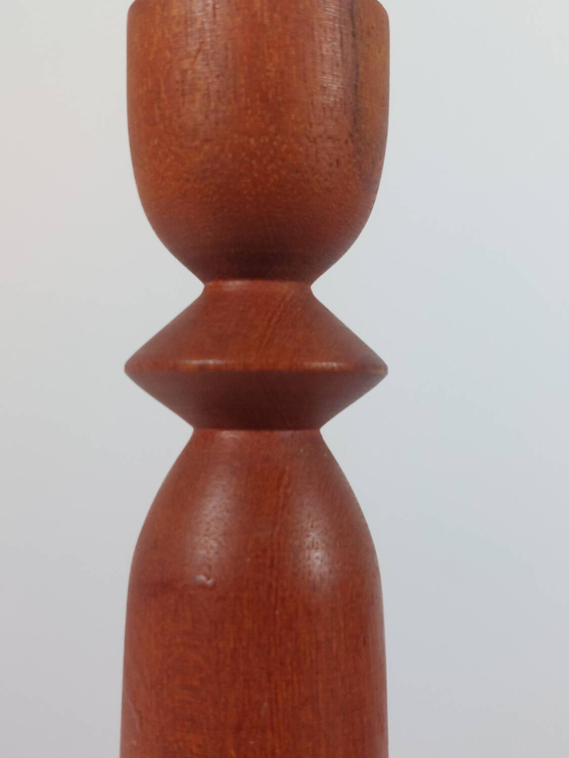 Vintage pair of sculptural teak candlesticks in Scandinavian style.