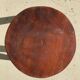 tabouret en bois massif brun assise circulaire plate