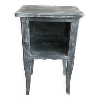 Weathered wooden bedside table