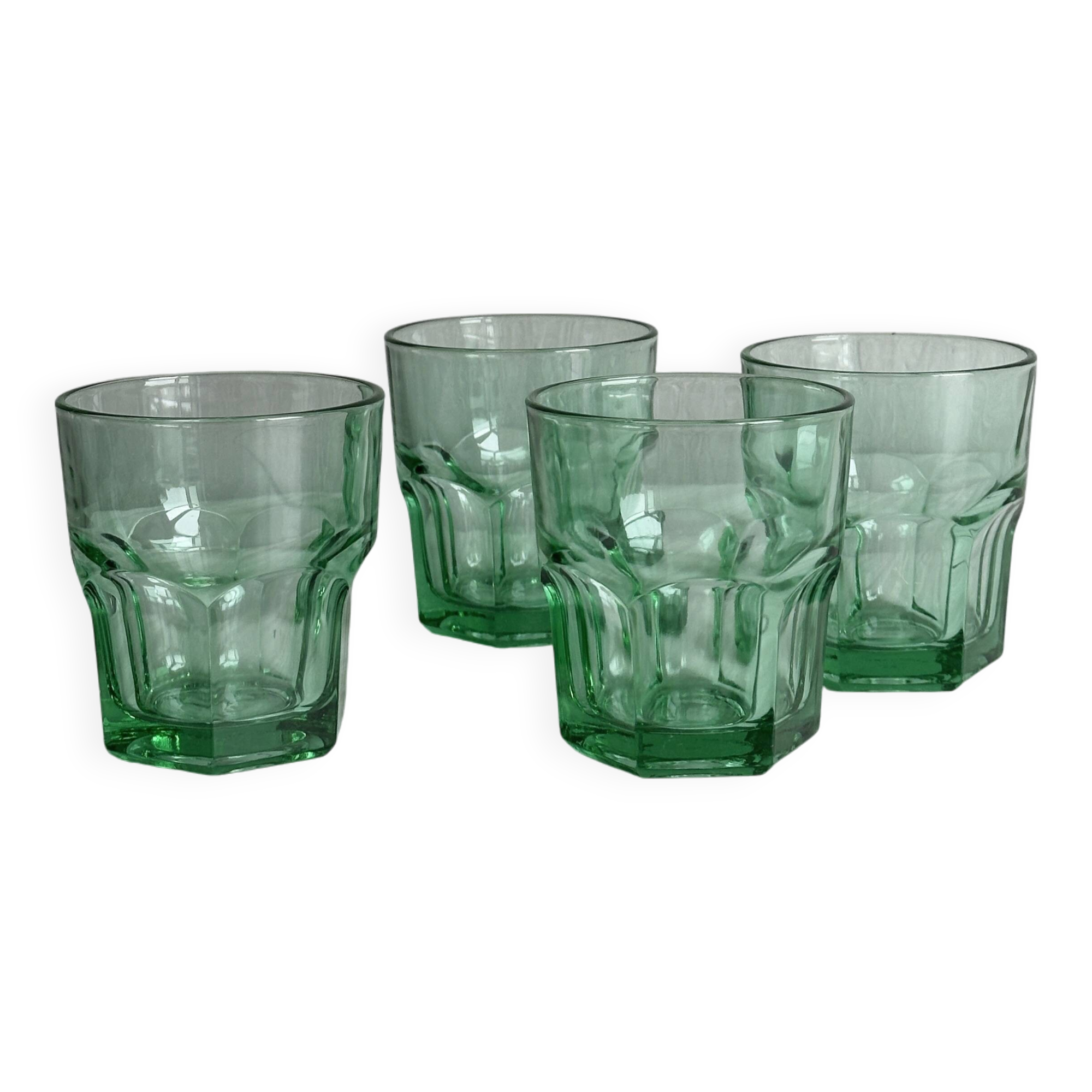 4 vintage water glasses in translucent green glass