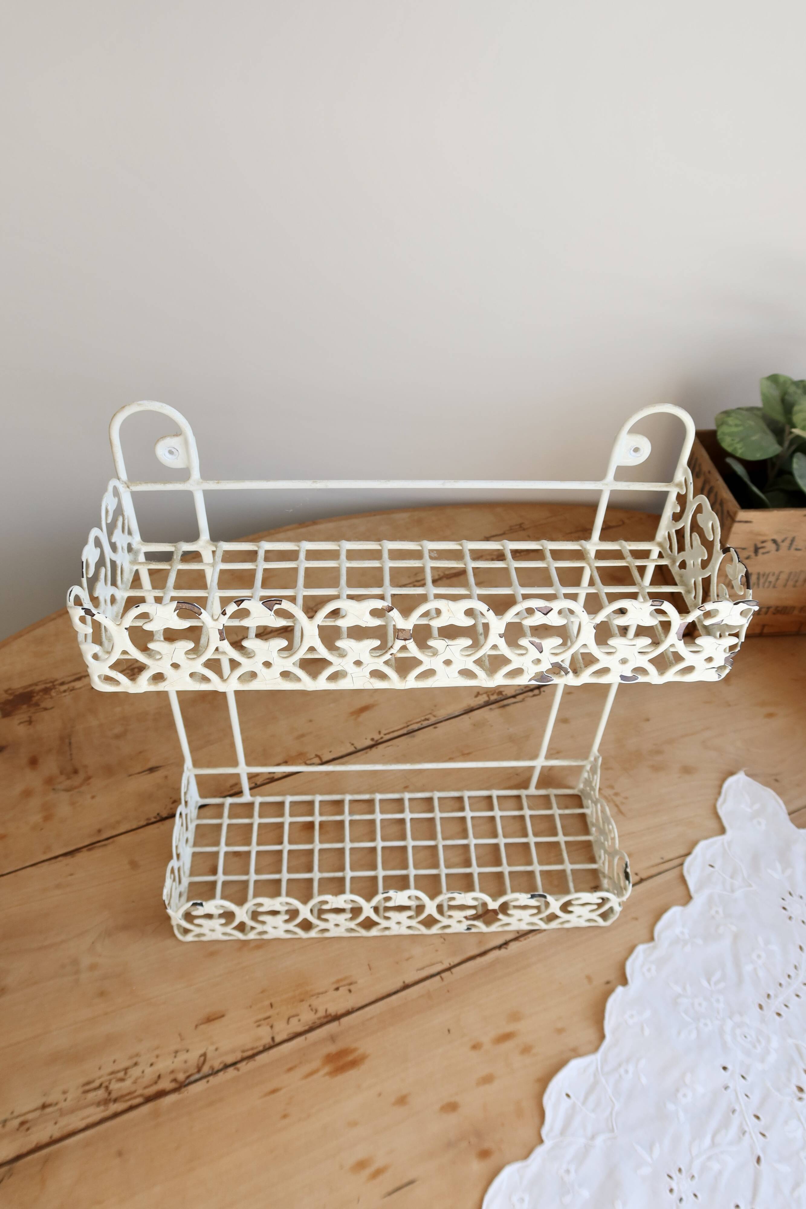 Vintage ivory patinated metal wall shelf