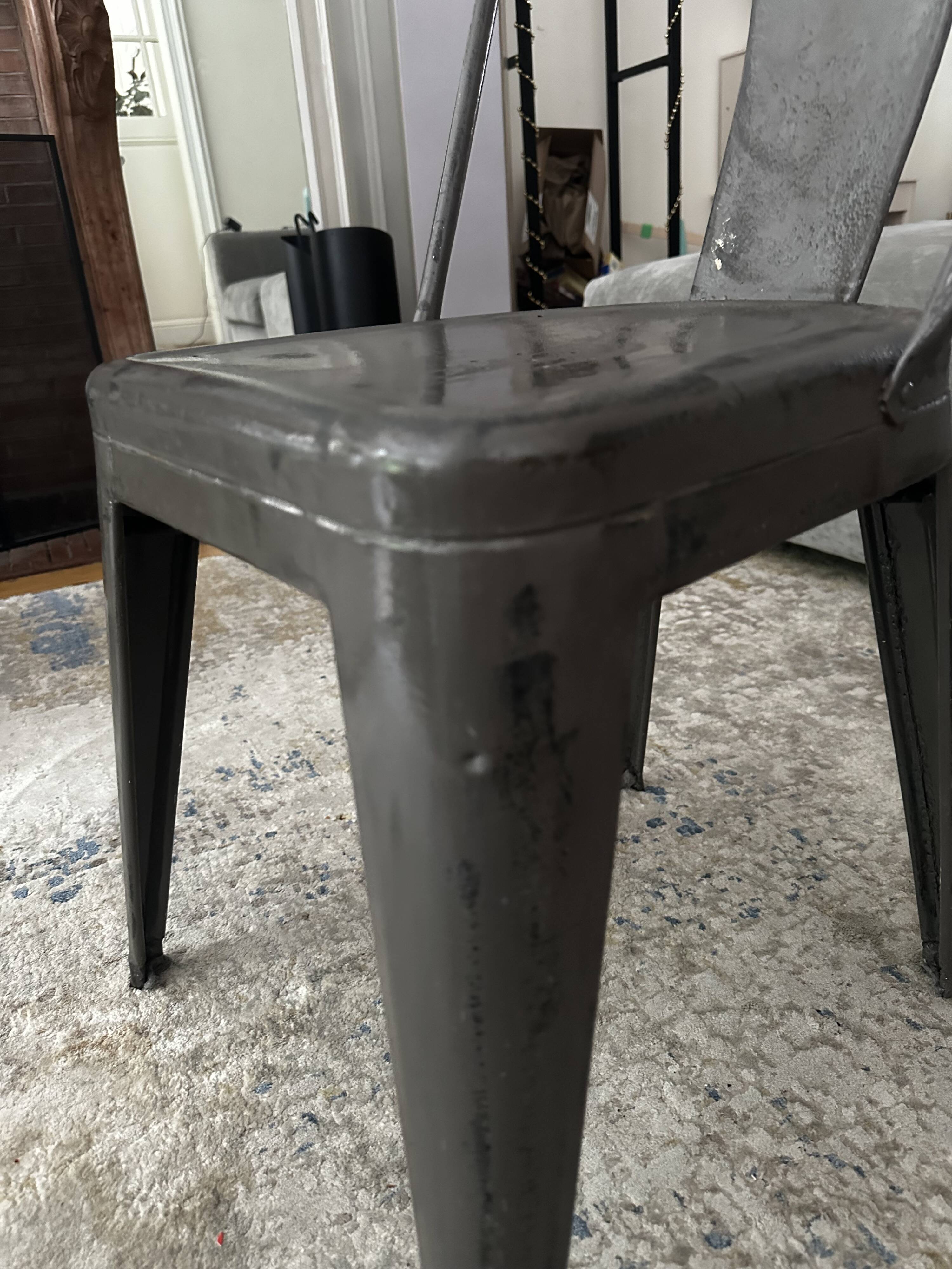 Pair of vintage Tolix model A chairs, designed by Xavier Pauchard.