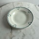 Set of 3 St Amand deep plates with green crown decoration.