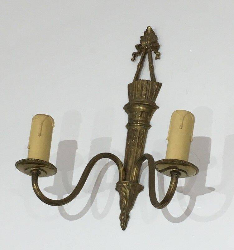 Pair of Louis XVI style bronze wall sconces with quivers and ribbons