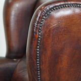 Large Sheepskin Leather Wingback Armchair with a Fixed Seat Cushion and a Stunning Patina