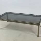 Brass coffee table with smoked glass top by Guy Lefevre, 1970s
