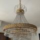 Brass hot air balloon chandelier with cascade of tassels