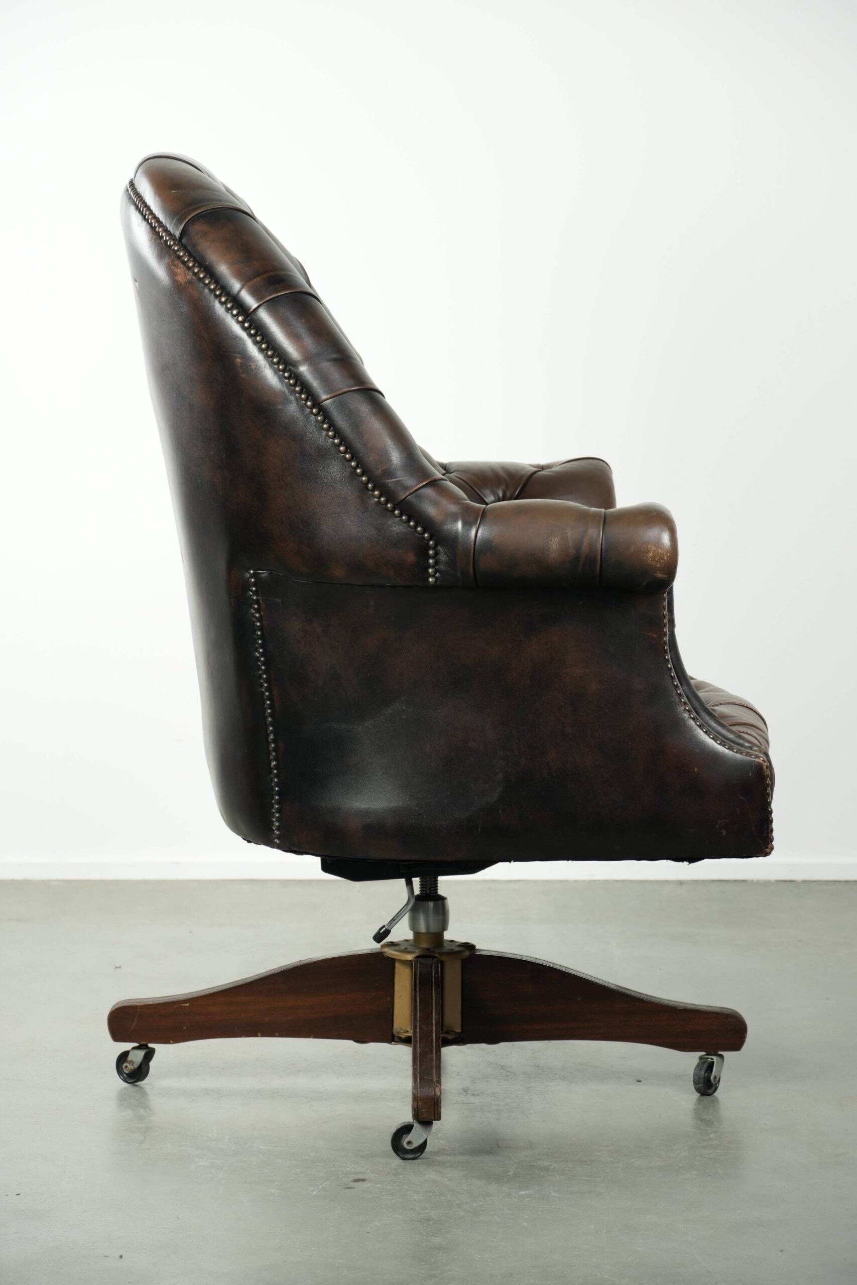 Vintage Chesterfield office chair with decorative nails in English style