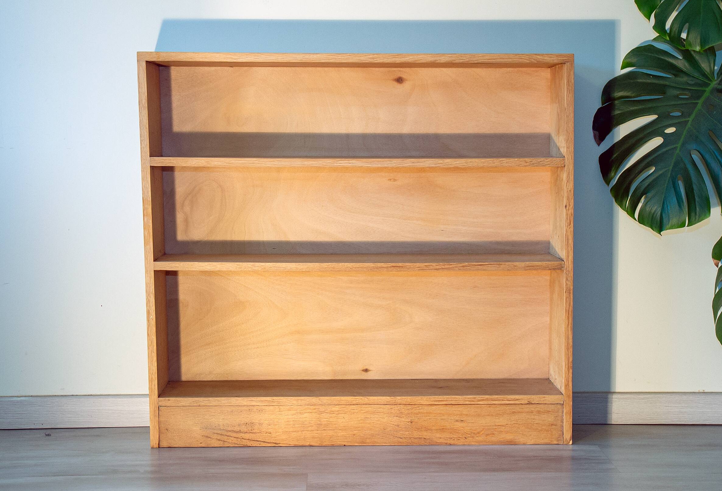 Bookshelf in light, raw solid oak from the 1950s.