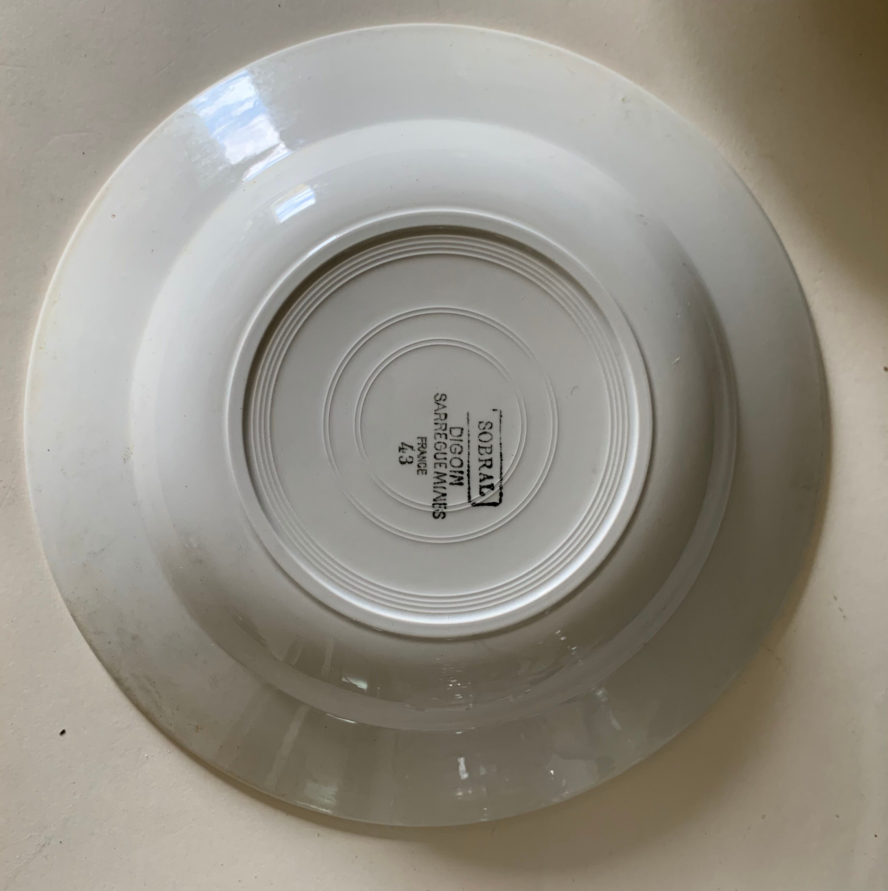 5 plates of Digoin earthenware