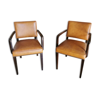 Pair de fauteuils art déco cuir capitonné