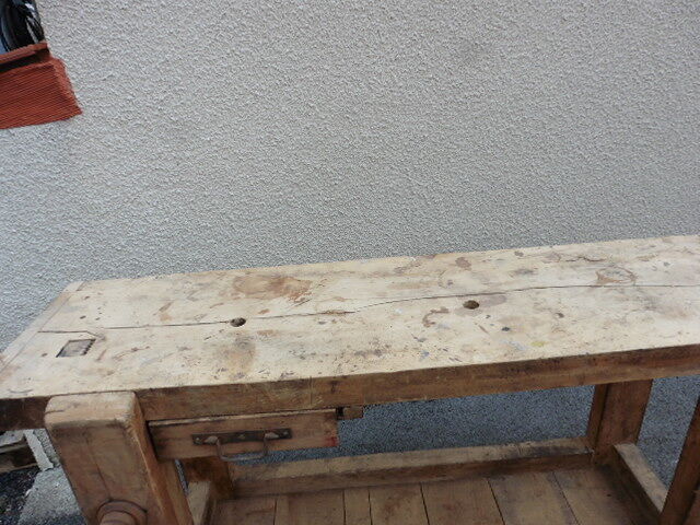 old solid wood workbench with drawer and seal