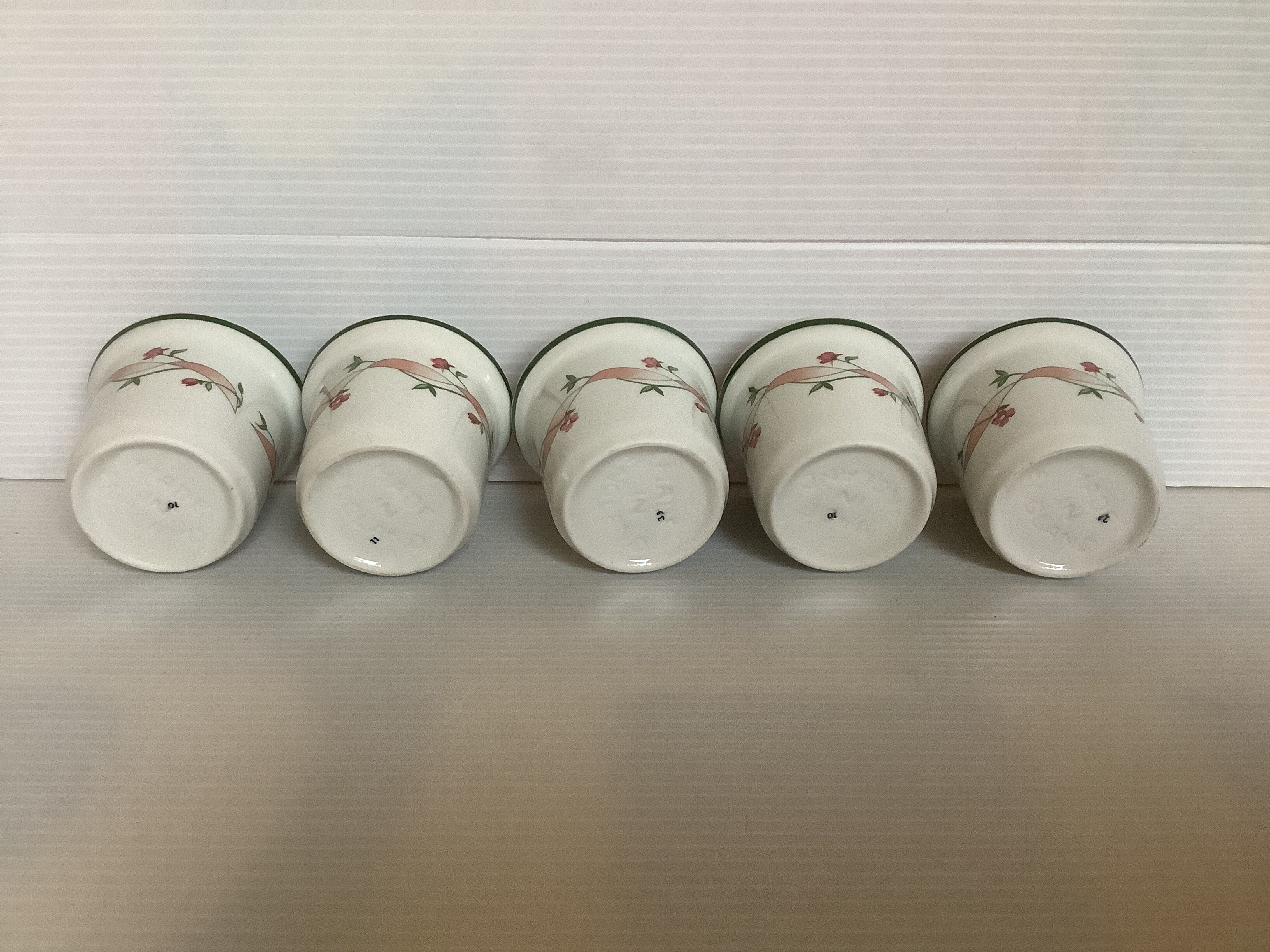 5 pink flower egg cups made in England