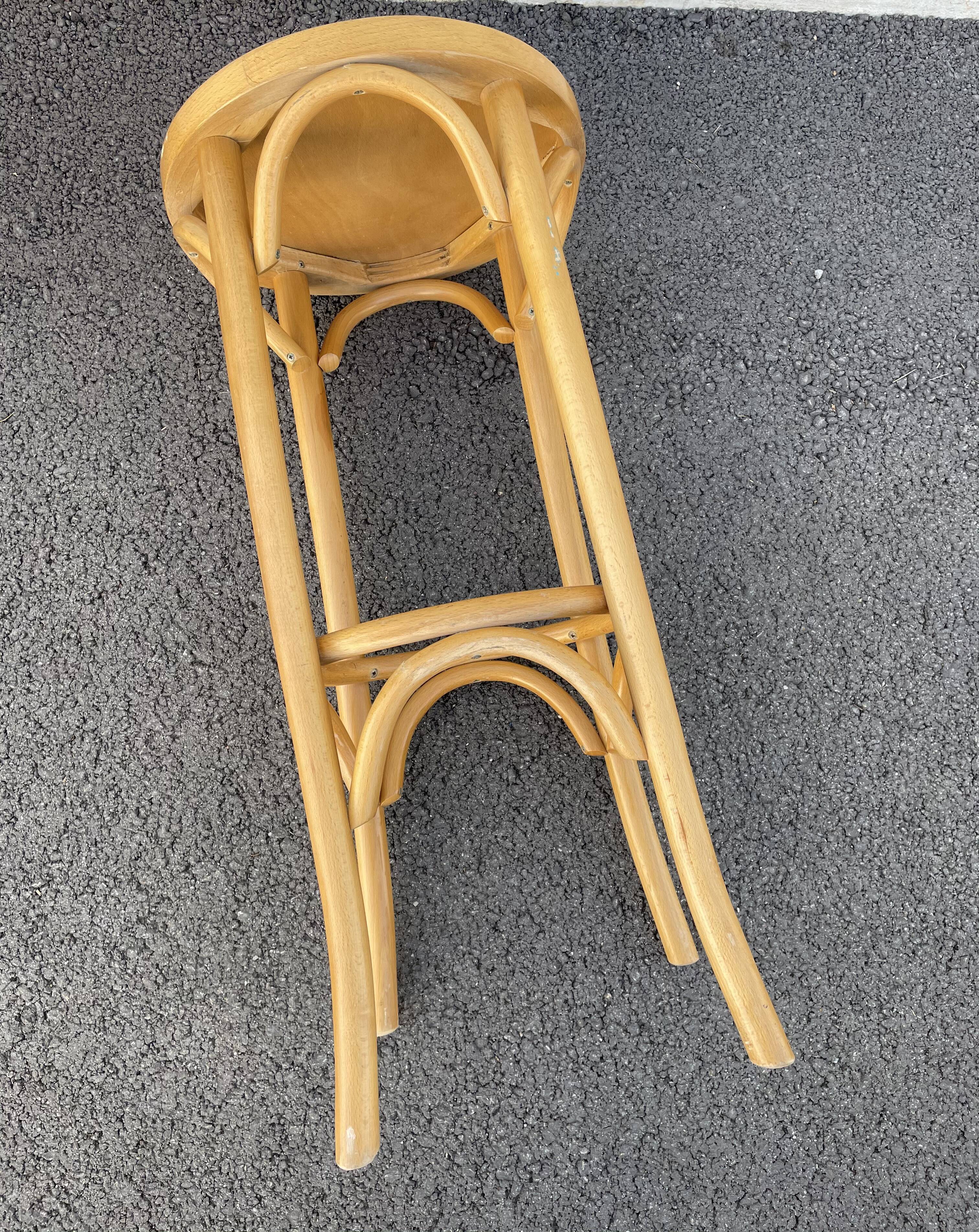 Curved wooden bar stool