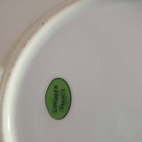 set of 4 dessert plates in white Limoges porcelain with flowers, the edge of one is different