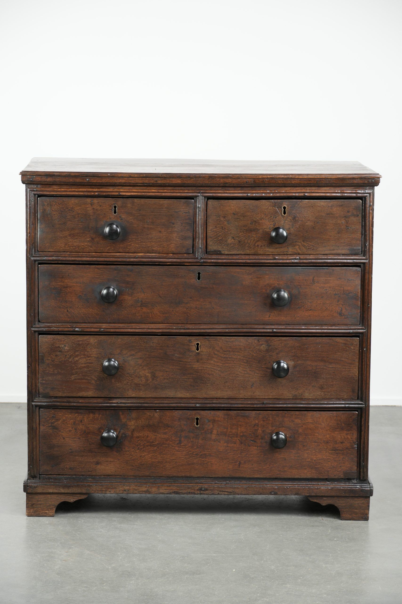 English antique oak chest of drawers / commode from the early 18th century